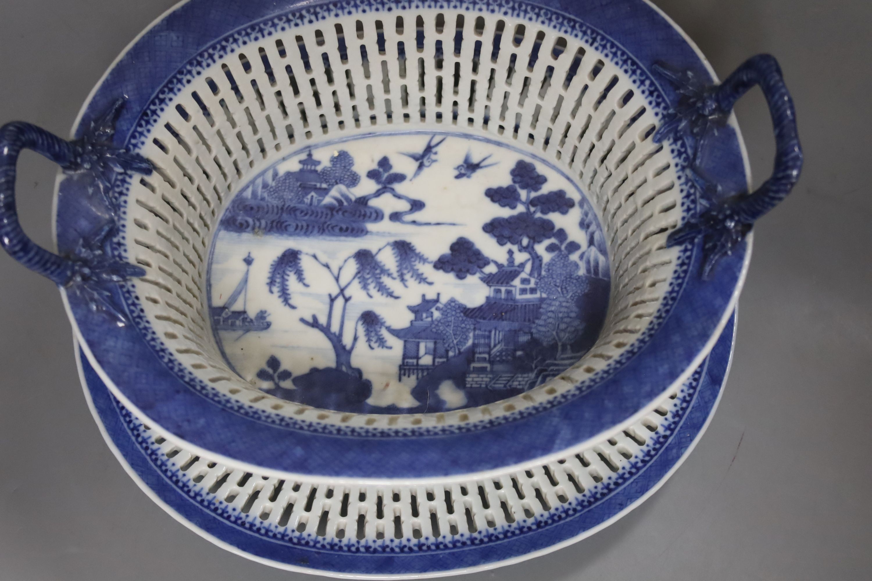 A Chinese blue and white chestnut basket and stand, Qianlong period, basket 11 cms high.